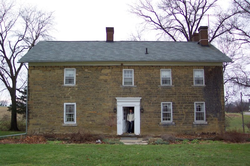 meinthedoorwayofthestonehouse.jpg
